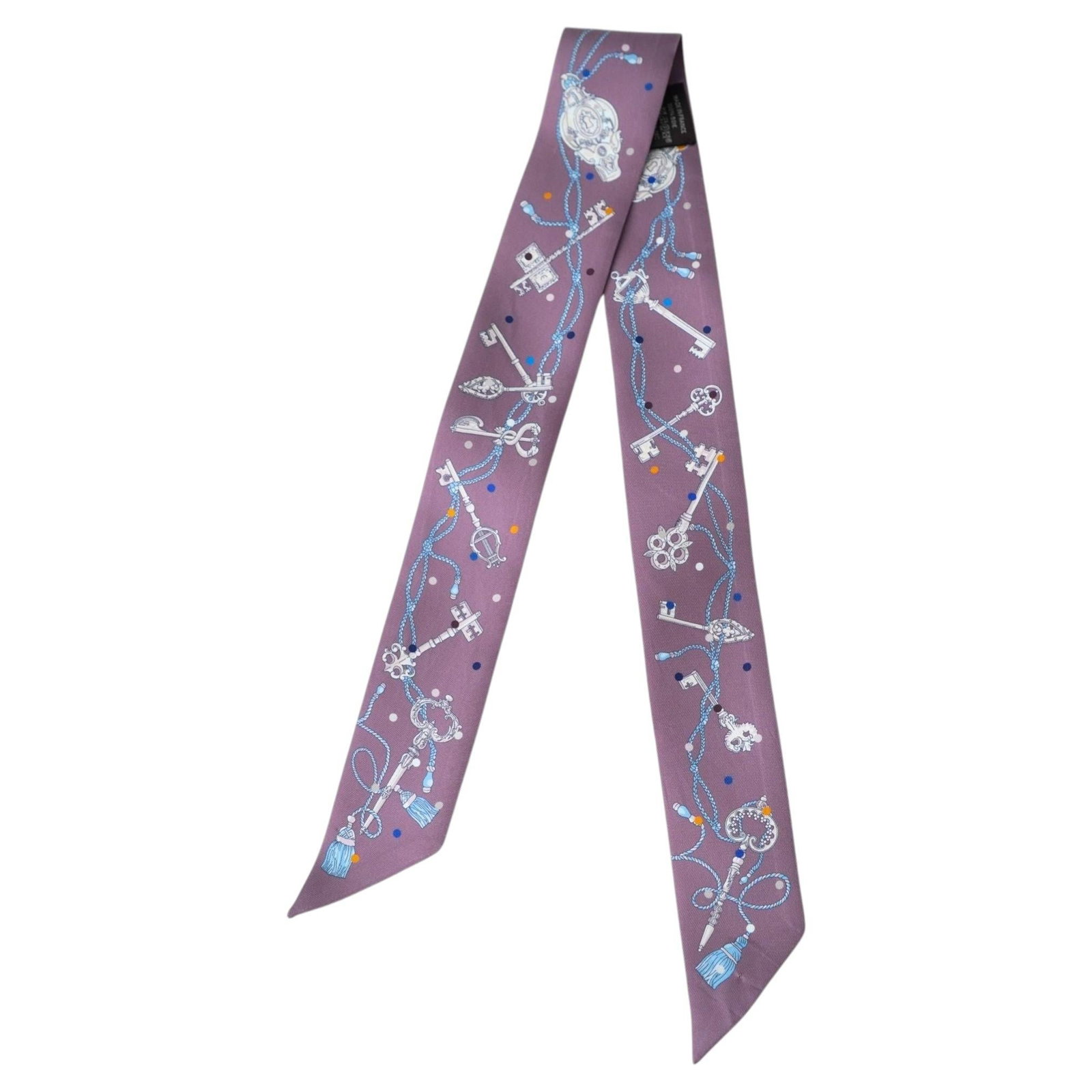Hermes Les Cles a Pois Twilly Silk Scarf Mauve with Box: Hermes Les Cles a Pois Twilly Silk Scarf Mauve with Box Hermes Les Cles a Pois silk twilly scarf in mauve purple with a printed key, rope, tassel, and polka dot motif. This narrow scarf features light