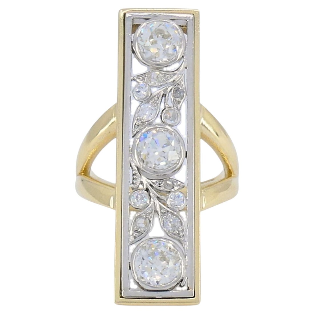 1940s Old European Cut Diamond Ring in 14k Gold and Platinum: 1940s Old European Cut Diamond Ring in 14k Gold and Platinum Vintage 14k yellow gold and platinum ring set with old European cut diamonds. The design features an elongated rectangular platinum plaque 