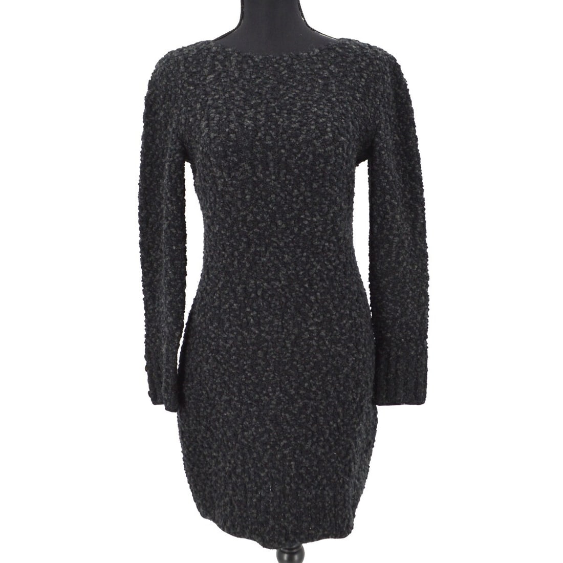 CHANEL 94A black wool nylon long sleeve dress size 40: CHANEL 94A black wool nylon long sleeve dress size 40 Black Chanel long-sleeve knee-length dress from the 94A collection. Made in Italy, this women's one-piece dress is crafted from wool and nylon for