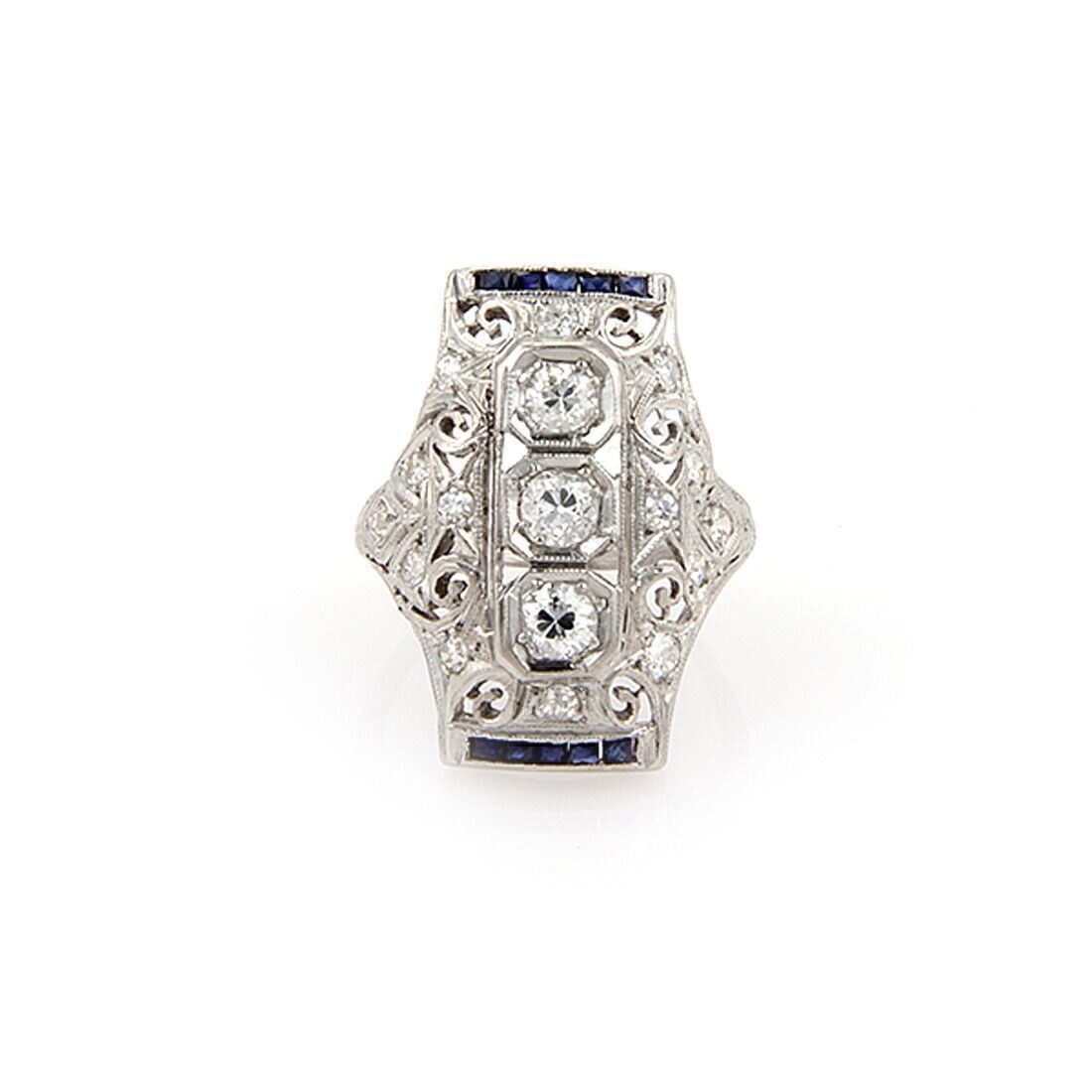 Platinum Openwork Filigree Ring with Diamonds and Blue Sapphires Size 5: Platinum Openwork Filigree Ring with Diamonds and Blue Sapphires Size 5 Vintage/estate style ring with an elongated open filigree design, accented by diamonds and blue sapphires. Delicate milgrain det