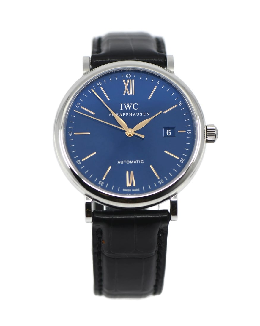 IWC Portofino IW356523 men's automatic stainless steel wristwatch: IWC Portofino IW356523 men's automatic stainless steel wristwatch IWC Portofino stainless steel wristwatch with a polished silver-tone case and smooth bezel. It features a blue sunburst dial with Roma