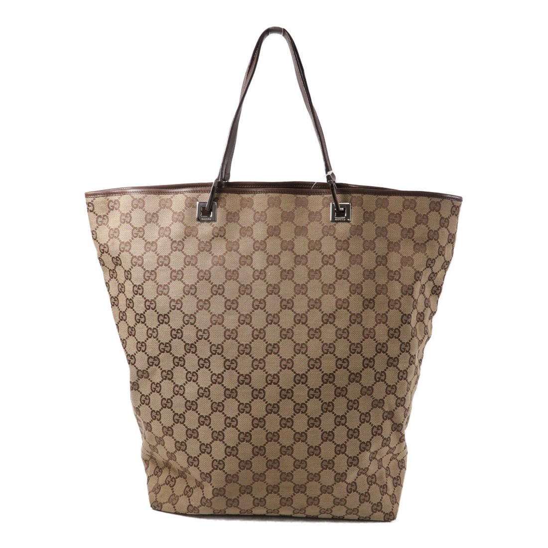 Gucci 31242 Brown GG Canvas Tote Bag for Women: Gucci 31242 Brown GG Canvas Tote Bag for Women Gucci tote bag in brown GG canvas with a spacious everyday silhouette and dual top handles. The interior includes two zip pockets for organization. Made 