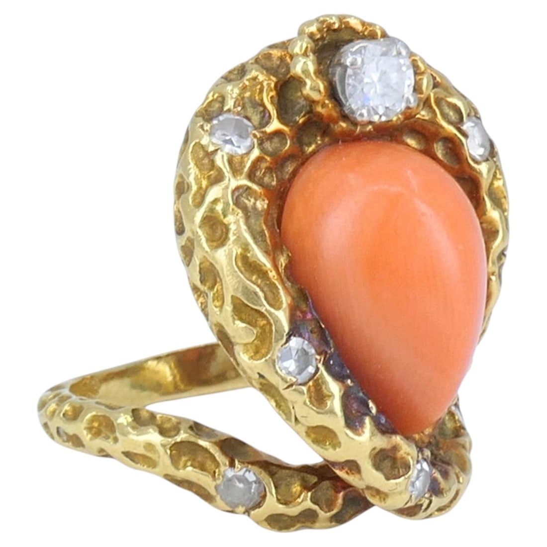 French 18k Gold Cobra Ring with Coral and Diamonds: French 18k Gold Cobra Ring with Coral and Diamonds Vintage French 18k gold ring designed with a stylized cobra snake motif in a bypass form. It features a pear-shaped cabochon coral accented by small 