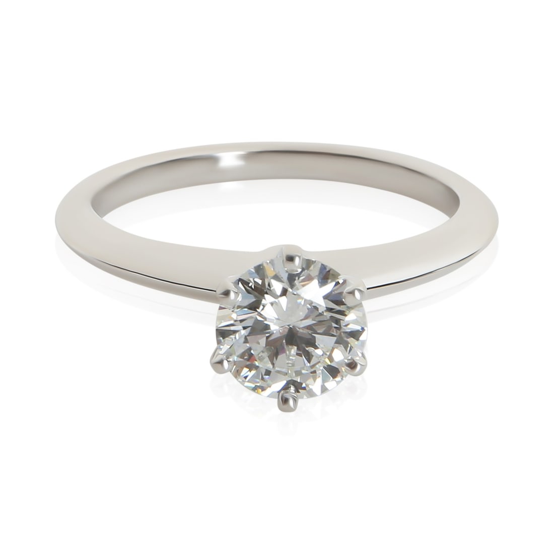 Platinum Tiffany & Co. 0.96 ct Round Diamond Ring Size 6: Platinum Tiffany & Co. 0.96 ct Round Diamond Ring Size 6 Pre-owned Tiffany & Co. engagement ring featuring a round brilliant diamond. Includes the original box, Tiffany Diamond Certificate, original r