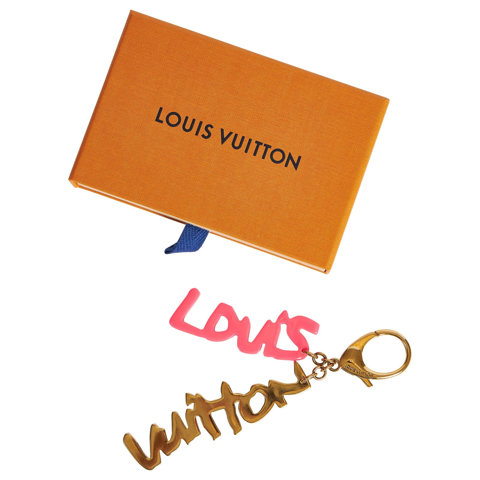 Louis Vuitton Pink Gold Tone Bag Charm Key Chain with Box: Louis Vuitton Pink Gold Tone Bag Charm Key Chain with Box Enhance your accessory collection with this exquisite Louis Vuitton Pink & Gold Bag Charm. This stylish key chain features the iconic Louis Vu