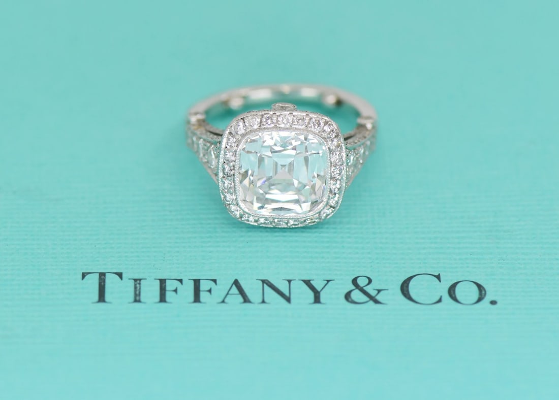 Tiffany Cushion Cut 4.47ct E VS1 Diamond Platinum Engagement Ring Size 4: Tiffany Cushion Cut 4.47ct E VS1 Diamond Platinum Engagement Ring Size 4 This Tiffany & Co. platinum engagement ring features a 4.47 carat natural cushion-cut diamond with an E color grade and VS1 cla