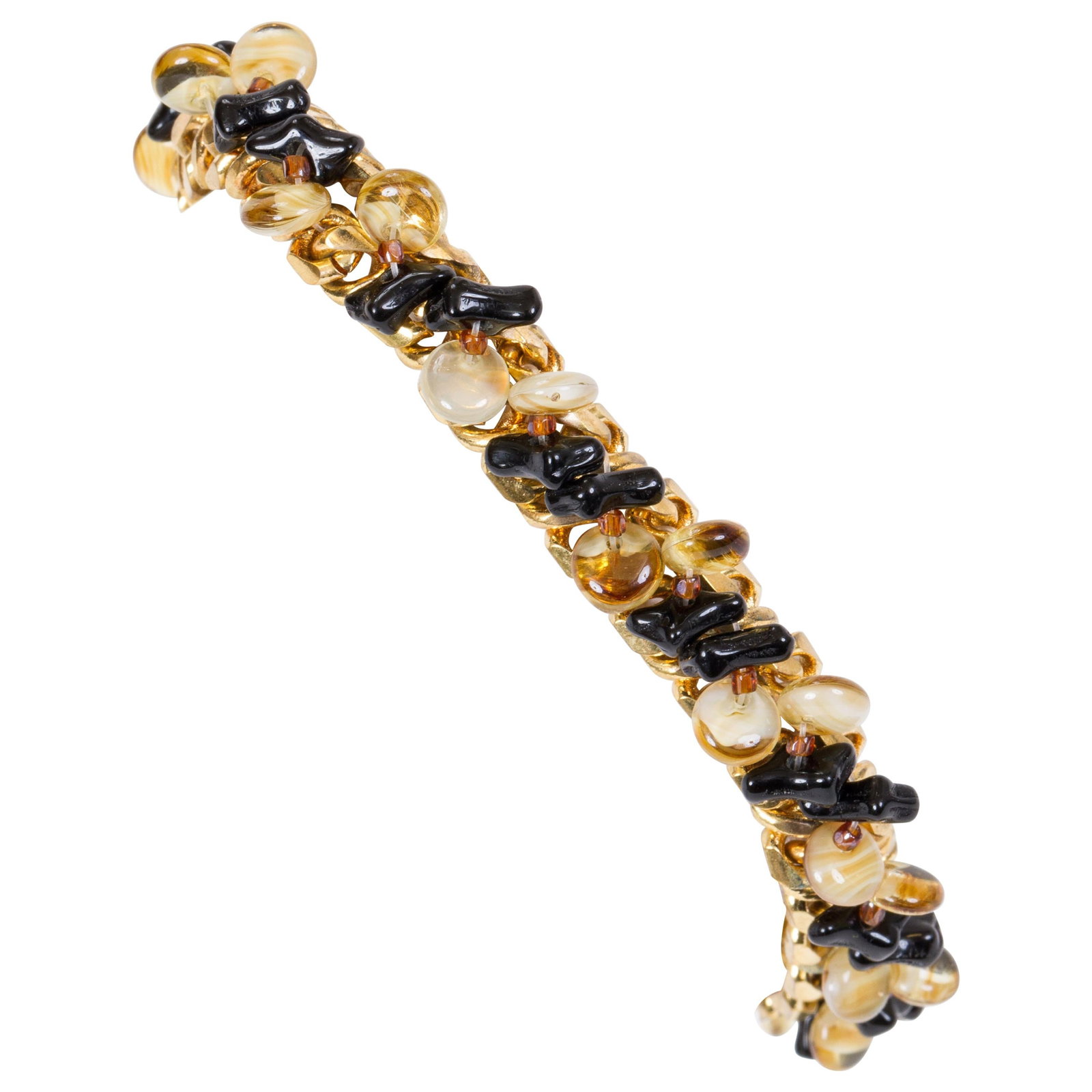 1990s Chanel Spring 99 Goldtone Bracelet with Glass Beads: 1990s Chanel Spring 99 Goldtone Bracelet with Glass Beads This exquisite 1990's Vintage Chanel bracelet showcases a stunning combination of goldtone metal and elegant brown and black glass beads. Orig