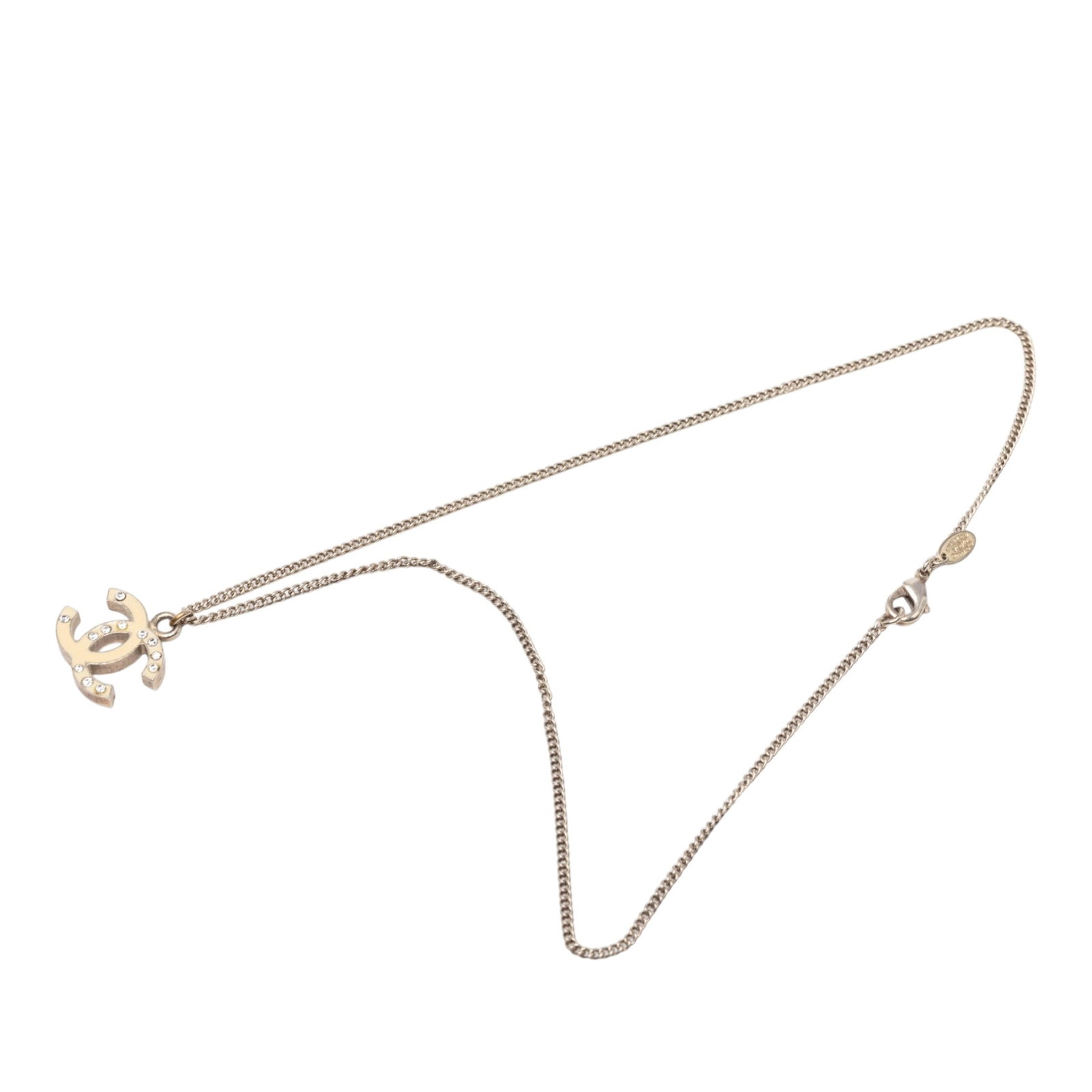 Chanel CC Pendant Necklace Gold Plated Enamel Strass: Chanel CC Pendant Necklace Gold Plated Enamel Strass Chanel pendant necklace featuring an interlocking CC logo with crystal embellishments on a gold-plated metal body. This costume jewelry piece is fi