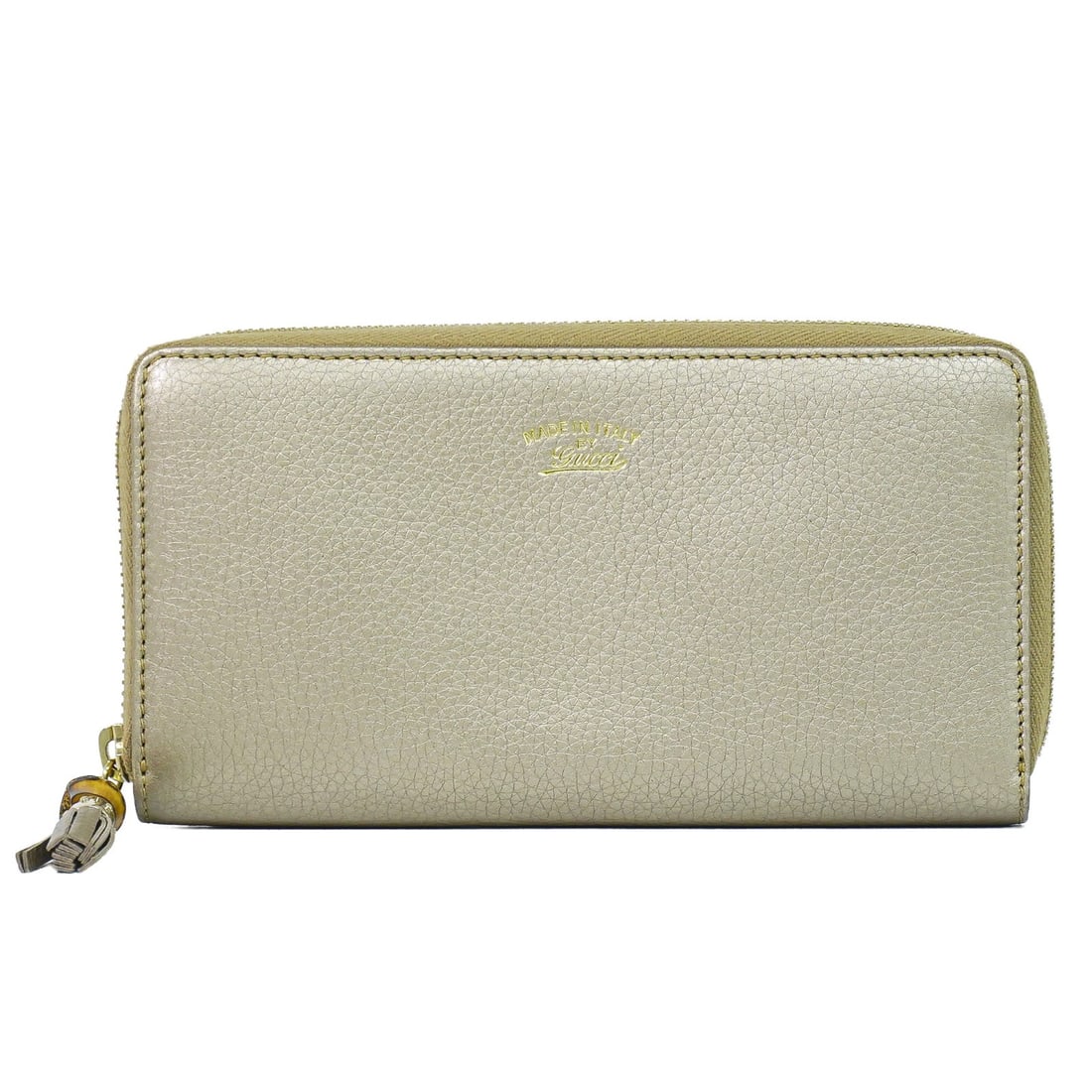 Gucci Bamboo Tassel Zip Leather Wallet Gold: Gucci Bamboo Tassel Zip Leather Wallet Gold Gucci Bamboo Tassel Zip wallet in gold leather with a slim profile and good overall condition. It shows slight wear from normal use, with very slight scuffi