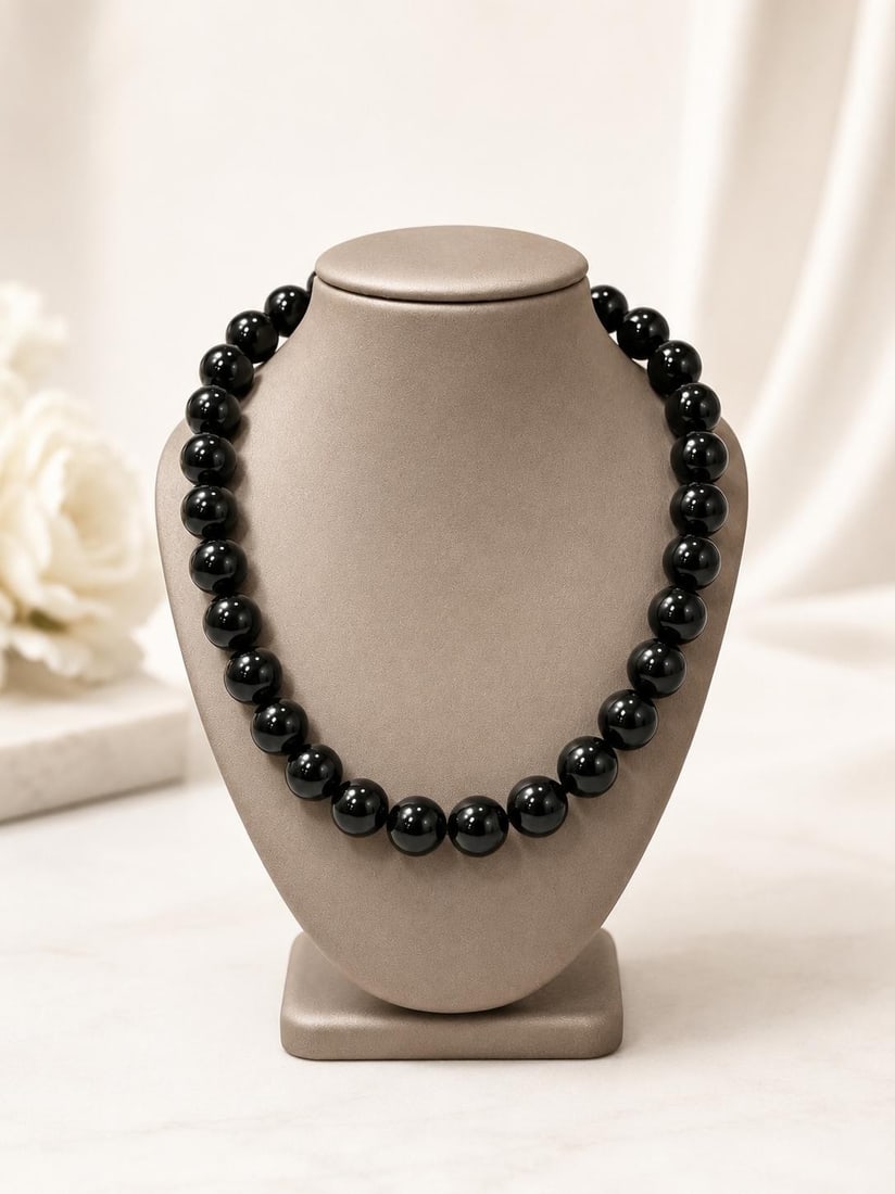 Black Onyx Bead Strand Necklace 17in Yellow Gold Filled Toggle Clasp: Black Onyx Bead Strand Necklace 17in Yellow Gold Filled Toggle Clasp Beaded necklace featuring natural black onyx round polished beads strung with a toggle clasp. This pre-owned piece shows some light