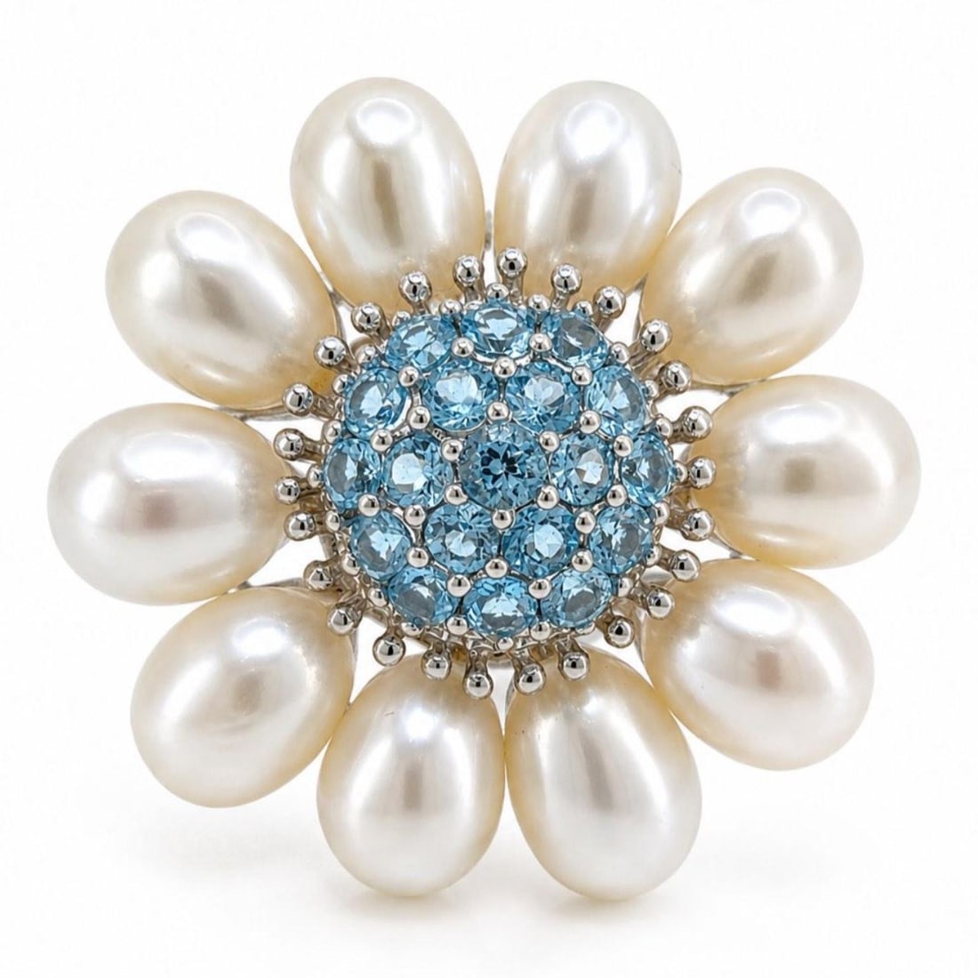 Blue Topaz and Freshwater Pearl 18K White Gold Brooch Pendant: Blue Topaz and Freshwater Pearl 18K White Gold Brooch Pendant An 18K white gold brooch/pendant set with approximately 5.00 ct of blue topaz and accented by 10 fresh-water pearls. This pre-owned piece 