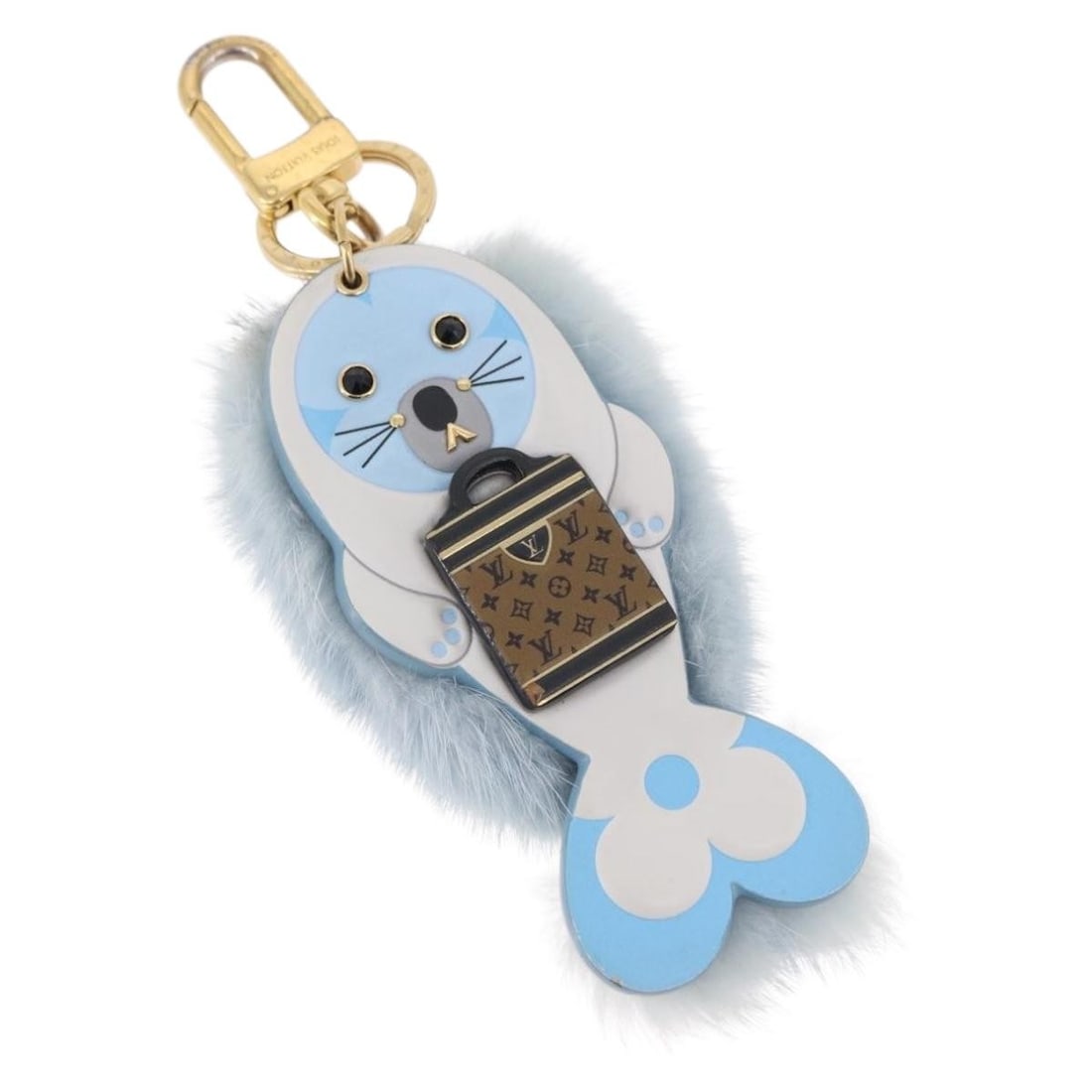 Louis Vuitton M00550 Porte Cles LV Seal Fur Bag Charm Light Blue: Louis Vuitton M00550 Porte Cles LV Seal Fur Bag Charm Light Blue Louis Vuitton Porte Cles LV Seal bag charm in light blue fur. This women's bag charm is made in Italy and comes as the item only; box a