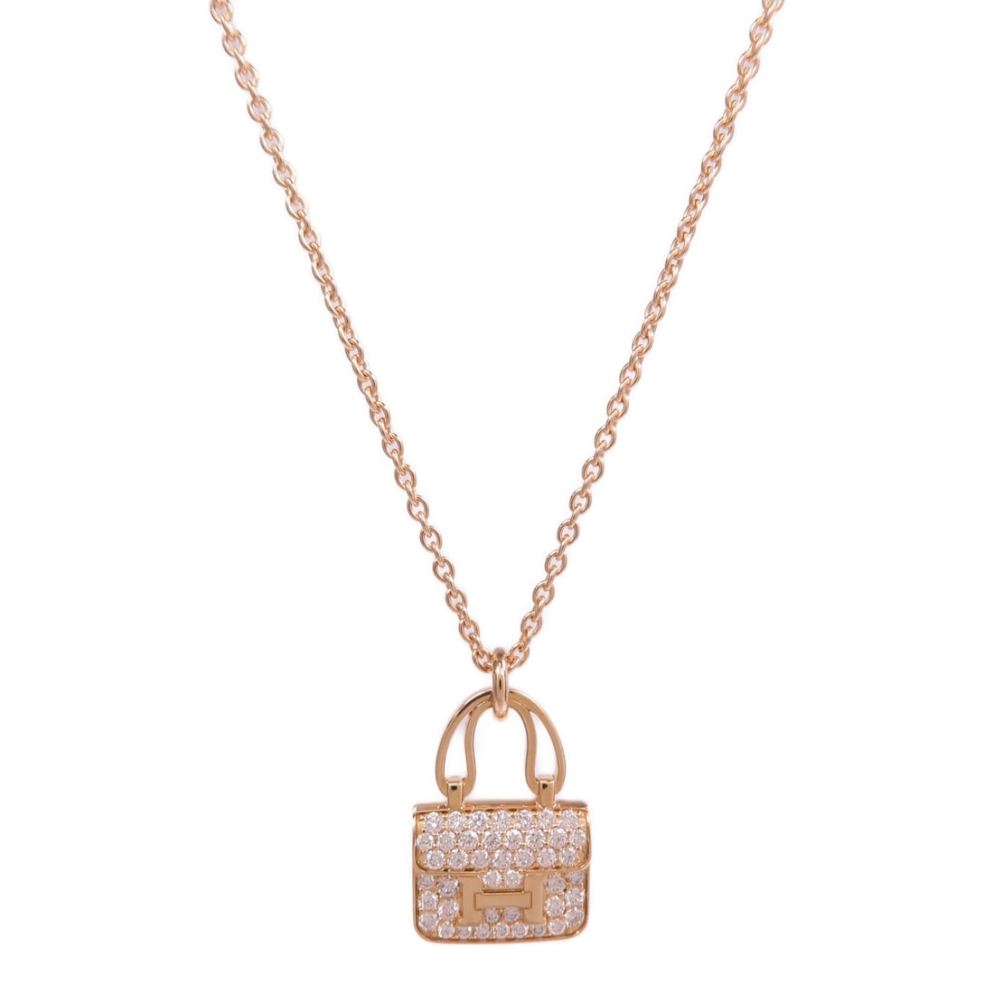 Hermes Amulettes Constance diamond necklace 18K rose gold: Hermes Amulettes Constance diamond necklace 18K rose gold Hermes Amulettes Constance Necklace in 18K pink gold with diamond accents. This women's necklace is described as clear in color and comes with