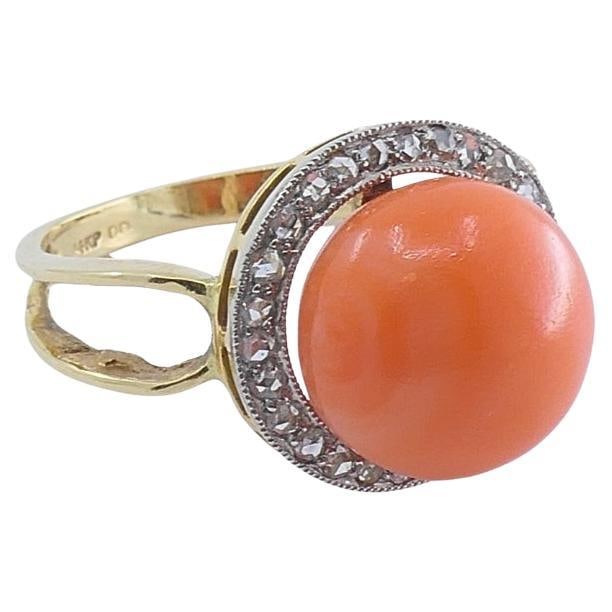 14k Gold Coral and Diamond Halo Ring Vintage Size 5.75: 14k Gold Coral and Diamond Halo Ring Vintage Size 5.75 Vintage ring crafted in 14k gold with coral and diamond accents. The coral is described as a salmon pinkish hue and is set within a white gold ci