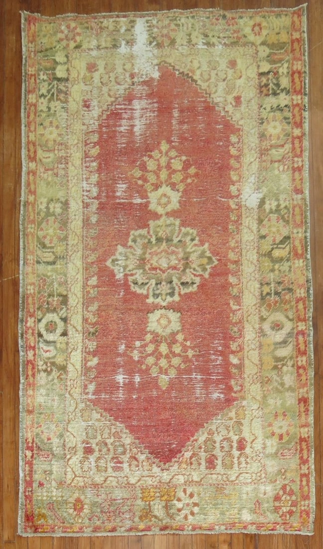 4' 5" x 8' 6" Early 20th Century Angora Oushak Rug: 4' 5" x 8' 6" Early 20th Century Angora Oushak Rug A worn antique Angora wool Oushak rug dating to the early 20th century. This pre-owned piece features the characterful distressed look associated wit