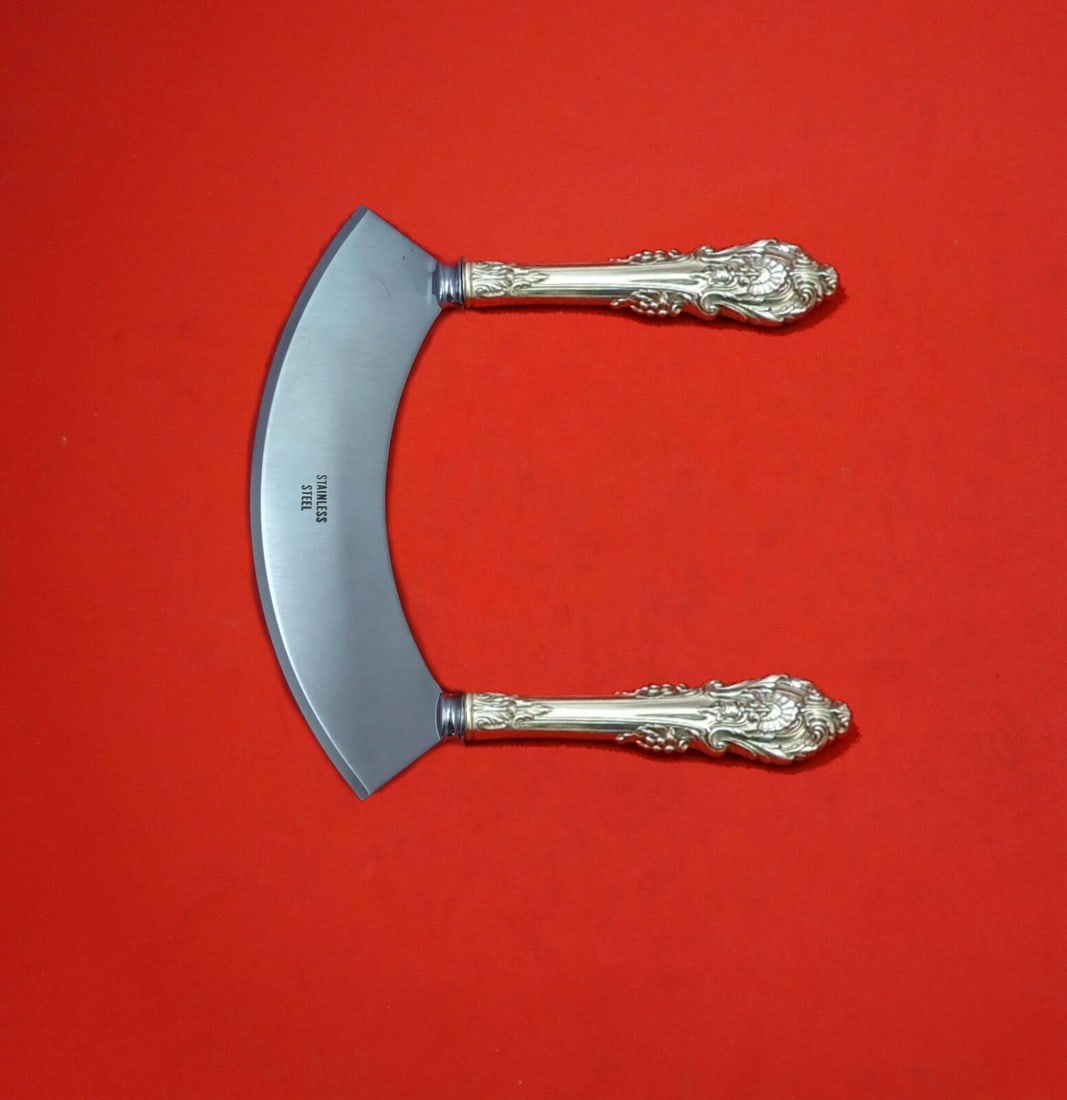 Wallace Sir Christopher Sterling Silver Mezzaluna Herb Chopper 6 1/4 Custom: Wallace Sir Christopher Sterling Silver Mezzaluna Herb Chopper 6 1/4 Custom A custom-made Sir Christopher by Wallace mezzaluna knife in sterling silver with hollow handles and a stainless steel blade.