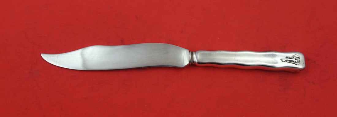 Tiffany & Co Sterling Silver Fish Knife Lap Over Edge Plain 7 3/4": Tiffany & Co Sterling Silver Fish Knife Lap Over Edge Plain 7 3/4" This exquisite fish knife from Tiffany & Co. features the elegant Lap Over Edge Plain pattern, crafted from high-quality sterling sil