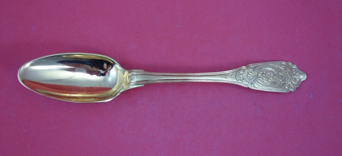 18th Century German Sterling Dinner Spoon Vermeil Fruit Vase: 18th Century German Sterling Dinner Spoon Vermeil Fruit Vase This German sterling dinner spoon features a pointed handle and a vermeil finish, adorned with intricate fruit and vase motifs. The spoon i