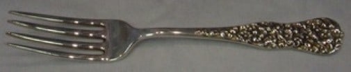 Dominick and Haff Rococo sterling silver fork 6 7/8: Dominick and Haff Rococo sterling silver fork 6 7/8 Sterling silver regular fork in the Rococo pattern by Dominick & Haff. This pre-owned piece is monogrammed, with monos varying, and is in excellent 
