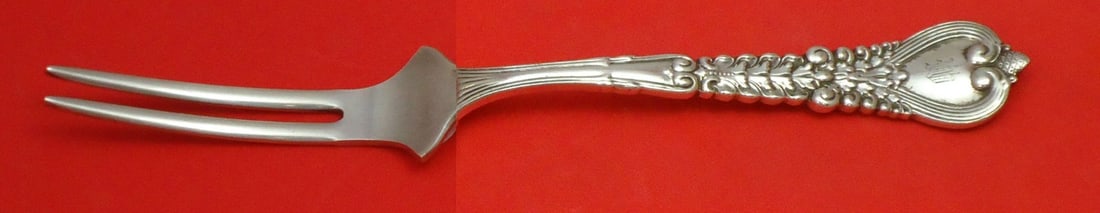 Tiffany & Co. Florentine Sterling Silver Custom Spinach Fork 7": Tiffany & Co. Florentine Sterling Silver Custom Spinach Fork 7" Introducing a stunning serving fork from the renowned Florentine pattern by Tiffany & Co. Crafted from high-quality sterling silver, thi