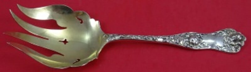 Shiebler American Beauty sterling salad fork 8 1/2 pierced gold washed: Shiebler American Beauty sterling salad fork 8 1/2 pierced gold washed This is a Shiebler sterling silver salad serving fork in the American Beauty pattern, dating from 1850 to 1899. The fork features