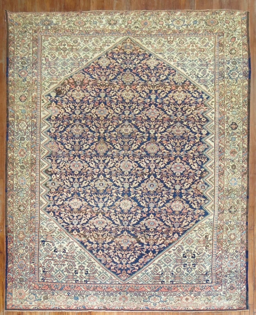 10' 2" x 14' Persian Sultanabad Mahal room rug: 10' 2" x 14' Persian Sultanabad Mahal room rug Early 20th century Persian Mahal rug with a navy field and an intricate floral design. This pre-owned room-size rug is identified as a Sultanabad/Mahal t