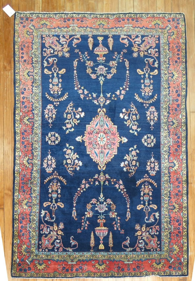4' 3" x 6' 7" Persian Sarouk Accent Rug: 4' 3" x 6' 7" Persian Sarouk Accent Rug Late 19th century Persian Sarouk rug in a navy blue Mohajeran design. This pre-owned accent rug reflects the classic Sarouk style and is presented as an individ
