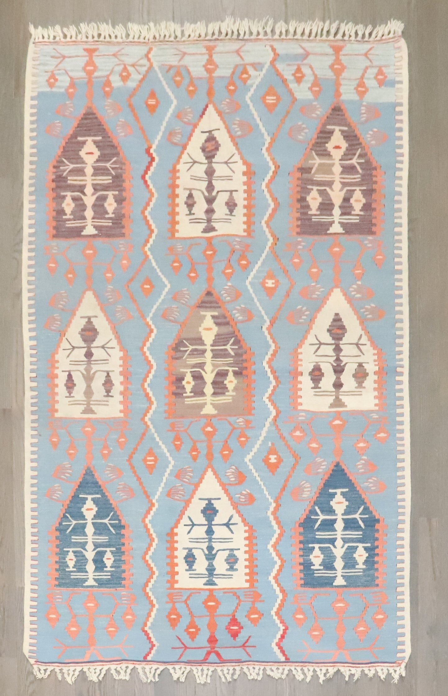 3' 7" x 5' 4" Turkish Kilim Rug Blue Tribal Flatweave: 3' 7" x 5' 4" Turkish Kilim Rug Blue Tribal Flatweave Scatter-size Turkish kilim with a blue tribal design and flatweave construction. This pre-owned rug is categorized as a small kilim. Specification