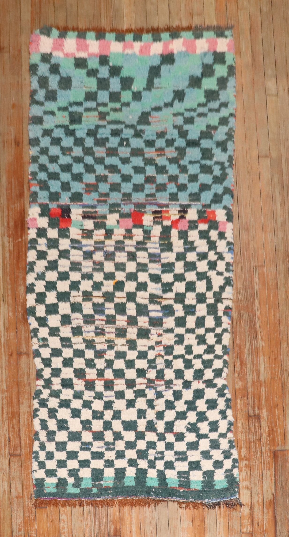 3' 2" x 7' 6" Moroccan runner rug checkerboard design: 3' 2" x 7' 6" Moroccan runner rug checkerboard design Vintage mid-20th century Moroccan runner featuring an archetypal checkerboard design. Made with industrial yarns, it shows traces of wear that cre