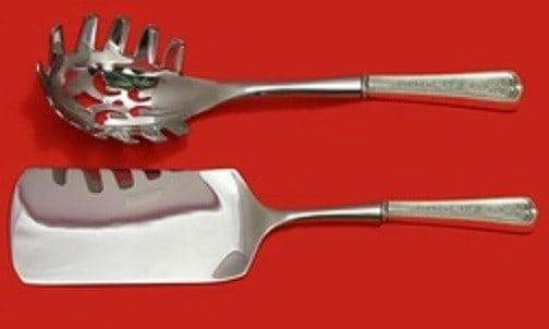 2 Piece Italian Serving Set Lexington by Dominick and Haff Sterling: 2 Piece Italian Serving Set Lexington by Dominick and Haff Sterling A pre-owned 2-piece Italian serving set in the Lexington pattern engraved by Dominick & Haff. The set features sterling silver custo