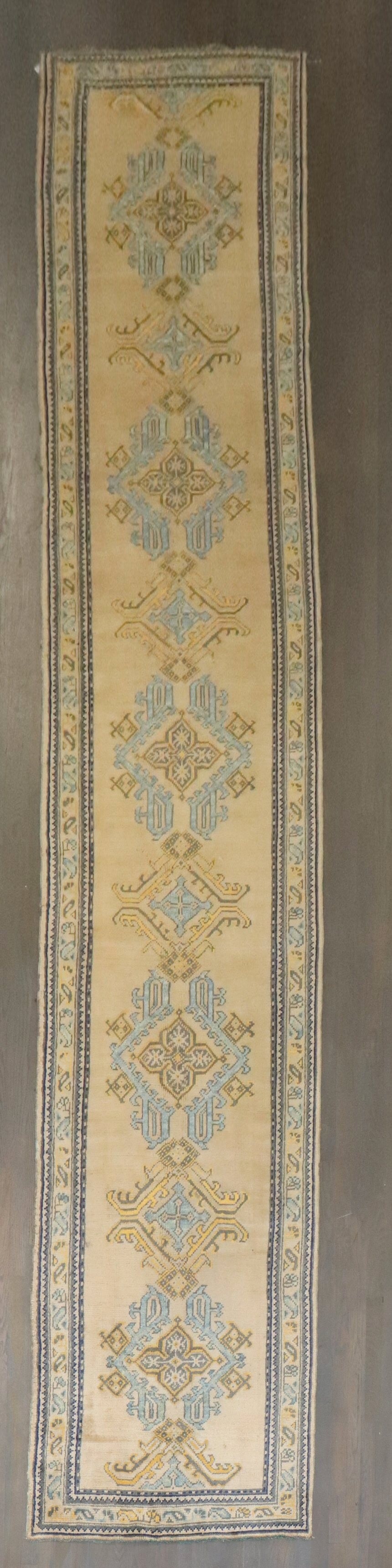 3' 2" x 17' 5" Turkish Oushak hallway runner: 3' 2" x 17' 5" Turkish Oushak hallway runner Early 20th century antique Turkish Oushak runner with a long, narrow form. This pre-owned rug is identified as an Oushak runner. Specifications Type: Ousha