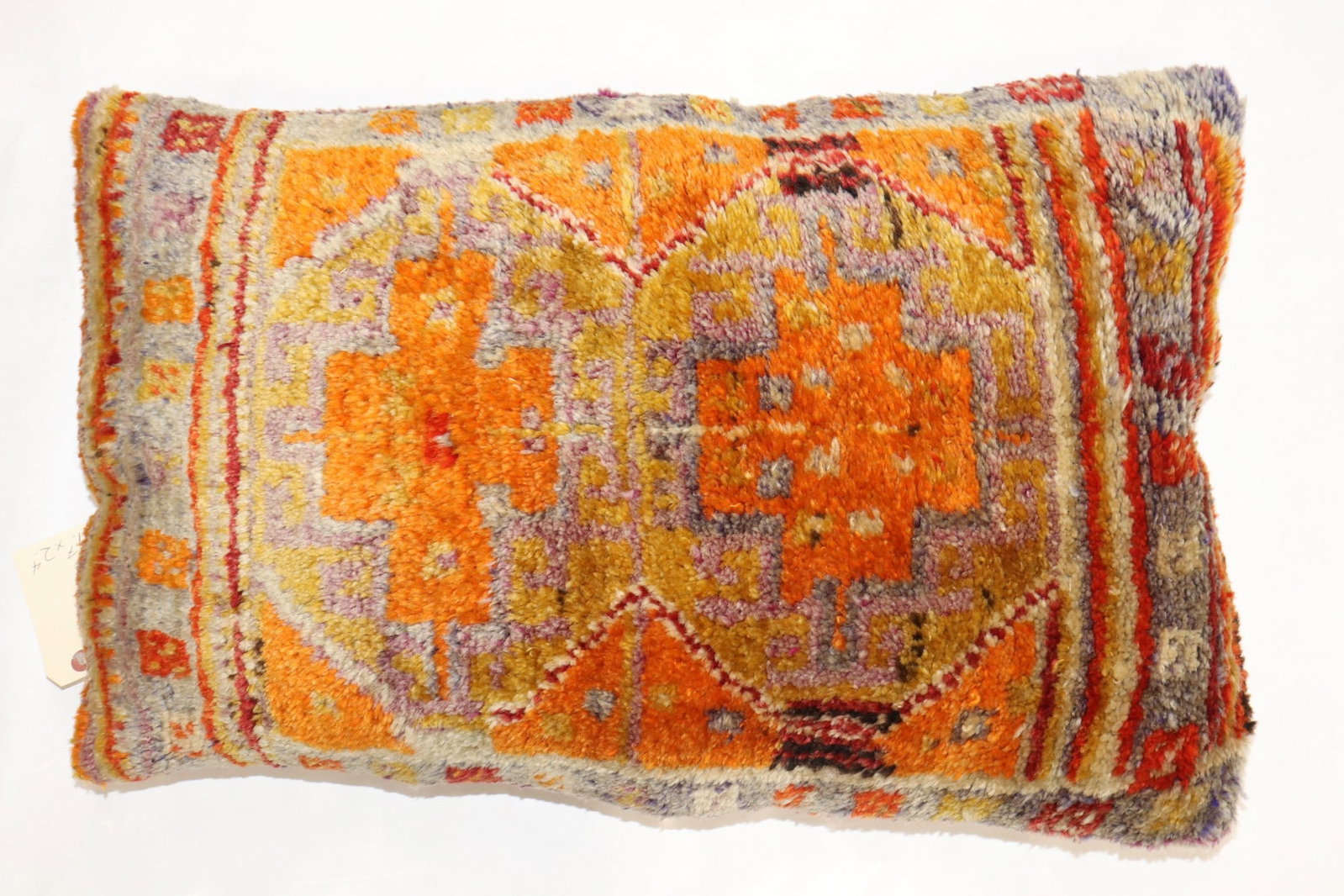 1' 7" x 2' 4" Anatolian Rug Pillow Turkish: 1' 7" x 2' 4" Anatolian Rug Pillow Turkish Decorative pillow made from an early 20th-century Turkish Anatolian rug. This pre-owned piece offers a distinctive textile look drawn from vintage rug materi