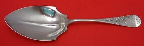 Whiting Antique Lily Engraved Sterling Silver Serving Spoon 9 1/4": Whiting Antique Lily Engraved Sterling Silver Serving Spoon 9 1/4" This exquisite Antique Lily Engraved Vegetable Serving Spoon by Whiting is a remarkable piece from the late 19th century, crafted bet