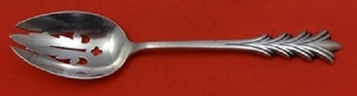 Tuttle Crest of Arden Sterling Silver Slotted Serving Spoon 8 1/4": Tuttle Crest of Arden Sterling Silver Slotted Serving Spoon 8 1/4" This exquisite slotted serving spoon is crafted from sterling silver and features the elegant Crest of Arden pattern by Tuttle.