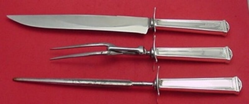 3 Piece Pantheon International Sterling Silver Carving Set: 3 Piece Pantheon International Sterling Silver Carving Set International Pantheon roast carving set in sterling silver with hollow handles and stainless steel blades/implements. This 3-piece serving s