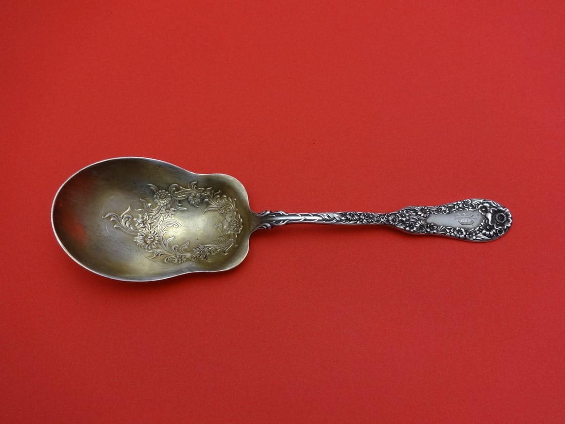 Dominick & Haff Sterling Silver Berry Spoon Number 10 with Flowers 8 in: Dominick & Haff Sterling Silver Berry Spoon Number 10 with Flowers 8 in This exquisite berry spoon from Dominick & Haff is crafted from sterling silver and features a charming flower design in the bow