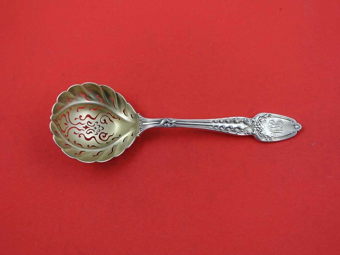 Tiffany & Co. Broom Corn Sterling Silver Sugar Sifter 7 1/4" Gold Wash: Tiffany & Co. Broom Corn Sterling Silver Sugar Sifter 7 1/4" Gold Wash This exquisite sugar sifter, crafted by Tiffany & Co., showcases the intricate Broom Corn pattern, renowned for its artistic desi