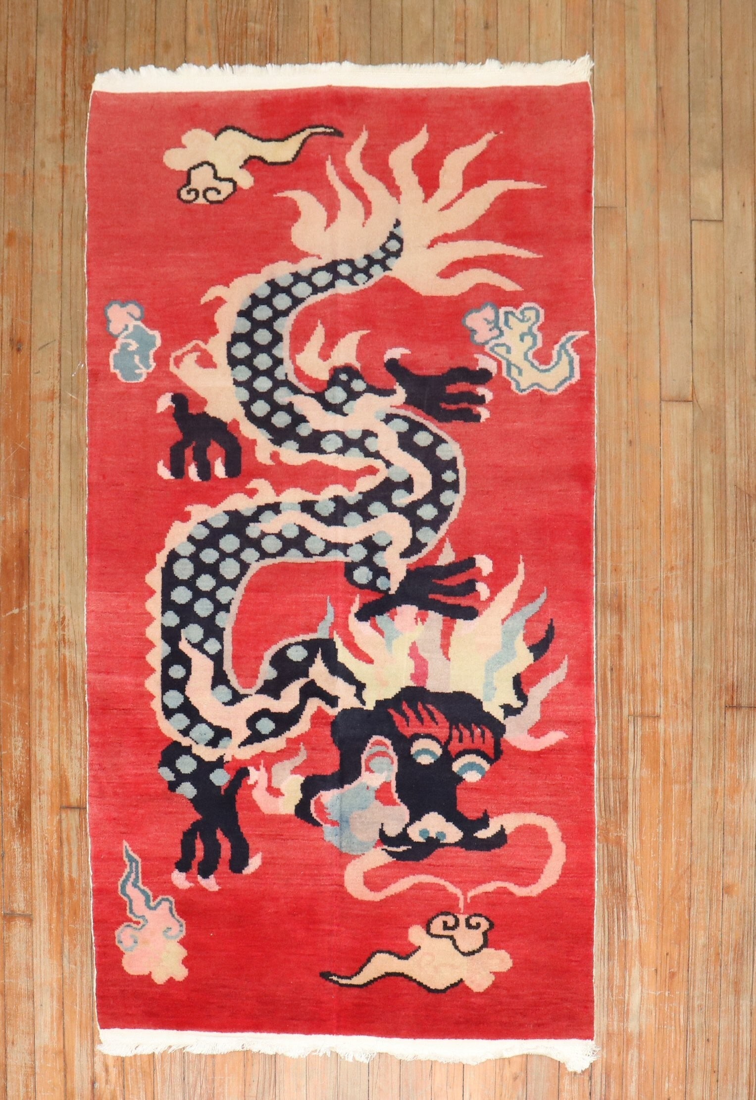 3' x 5' 7" Pictorial Tibetan Wool Rug Dragon Motif Red Ground: 3' x 5' 7" Pictorial Tibetan Wool Rug Dragon Motif Red Ground One-of-a-kind Tibetan pictorial rug from the 3rd quarter of the 20th century, featuring a dragon motif on a red ground. This small pre-own