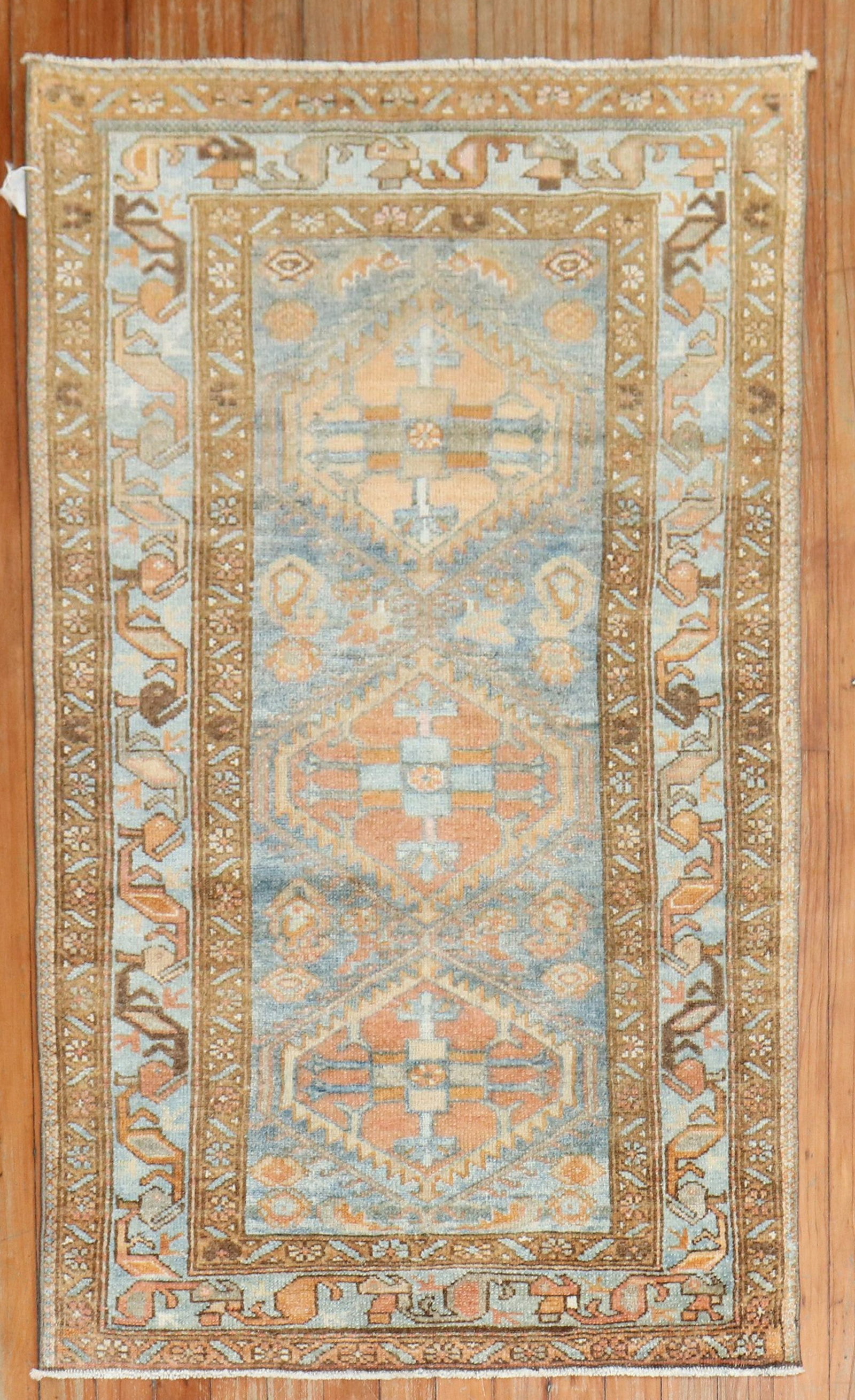 2' 7" x 4' 7" Persian Malayer Tribal Rug Blue Peach: 2' 7" x 4' 7" Persian Malayer Tribal Rug Blue Peach Early 20th century Persian Malayer scatter rug featuring a tribal design in blue and peach. This pre-owned small rug is identified as a Malayer type