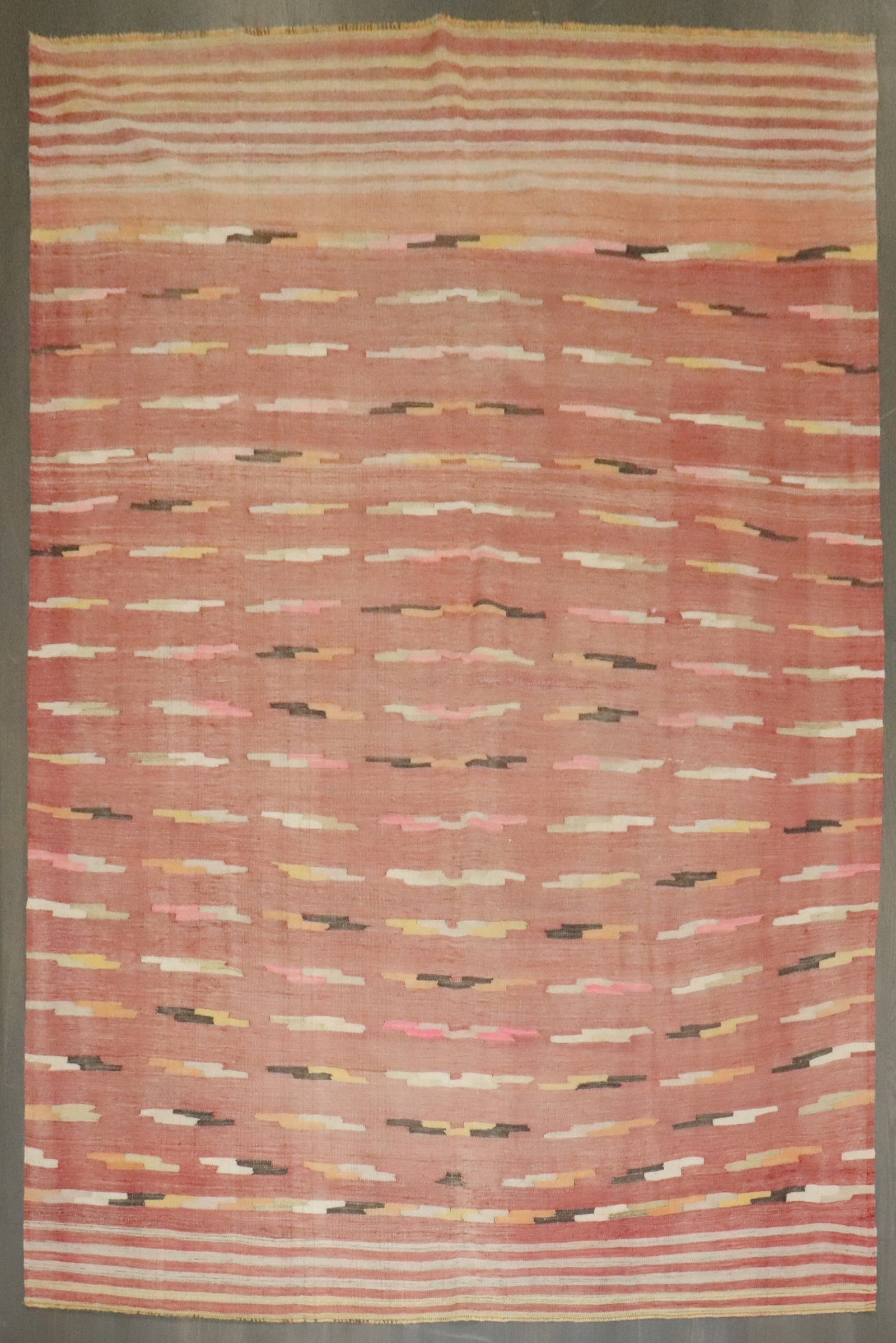 7' 3" x 10' 6" Turkish Kilim Room Rug Mid 20th Century: 7' 3" x 10' 6" Turkish Kilim Room Rug Mid 20th Century Vintage Turkish kilim flatweave rug from the mid 20th century, featuring a soft-tone design. This pre-owned room-size textile offers the classic 