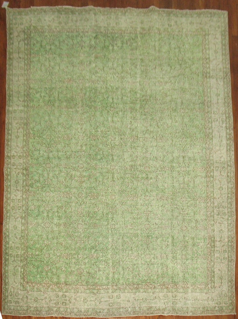 7' 1" x 10' 5" Light Green Turkish Overdye Room Rug: 7' 1" x 10' 5" Light Green Turkish Overdye Room Rug Mid 20th century Turkish rug in a light green tone. This pre-owned piece is identified as an overdye, shabby chic, Sparta room rug. Specifications O