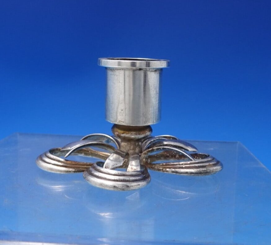 Elegant Sterling Silver Candlestick Five Petal Base 1 1/4 x 3: Elegant Sterling Silver Candlestick Five Petal Base 1 1/4 x 3 This elegant sterling silver candlestick showcases a unique five flower petal shaped base. Crafted from high-quality sterling silver (.925