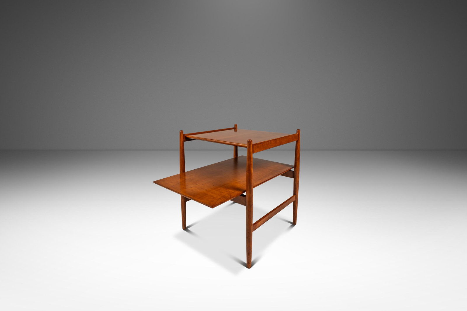 Kipp Stewart Suncoast Walnut Two Tier Accent Table: Kipp Stewart Suncoast Walnut Two Tier Accent Table This Mid-Century Modern end, side, or accent table from the Suncoast collection by Kipp Stewart for Drexel, crafted in the United States circa 1960s,