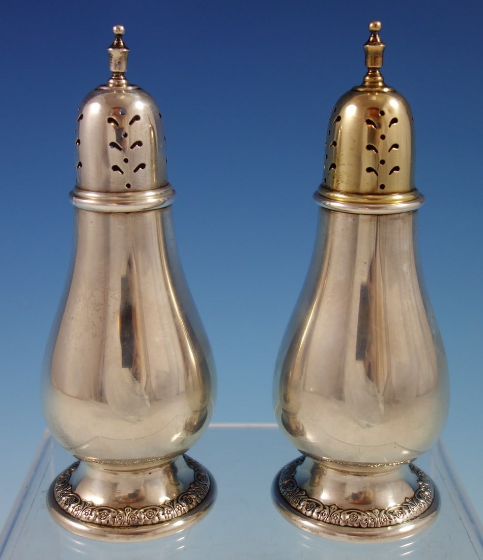 International Prelude Sterling Silver Salt Pepper Shaker Pair 5 Inch: International Prelude Sterling Silver Salt Pepper Shaker Pair 5 Inch This pair of sterling silver salt and pepper shakers is crafted in the Prelude pattern by International. Made in the United States 