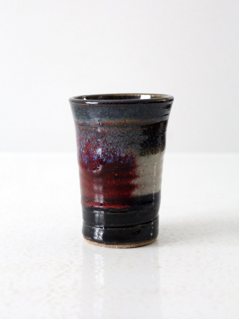 Signed Handmade Pottery Vase with Reactive Glaze: Signed Handmade Pottery Vase with Reactive Glaze This exquisite handmade vintage studio pottery vase features a breathtaking reactive glaze with deep blues, crimson, and earthy tones. A unique piece t