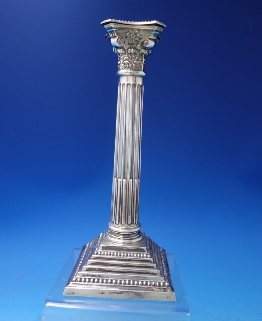 B.G. Georgian Sterling Silver Candlestick 10 x 3.75 Weighted: B.G. Georgian Sterling Silver Candlestick 10 x 3.75 Weighted This elegant Georgian-style candlestick by B.G. is crafted from sterling silver, showcasing the timeless design characteristic of the era. 