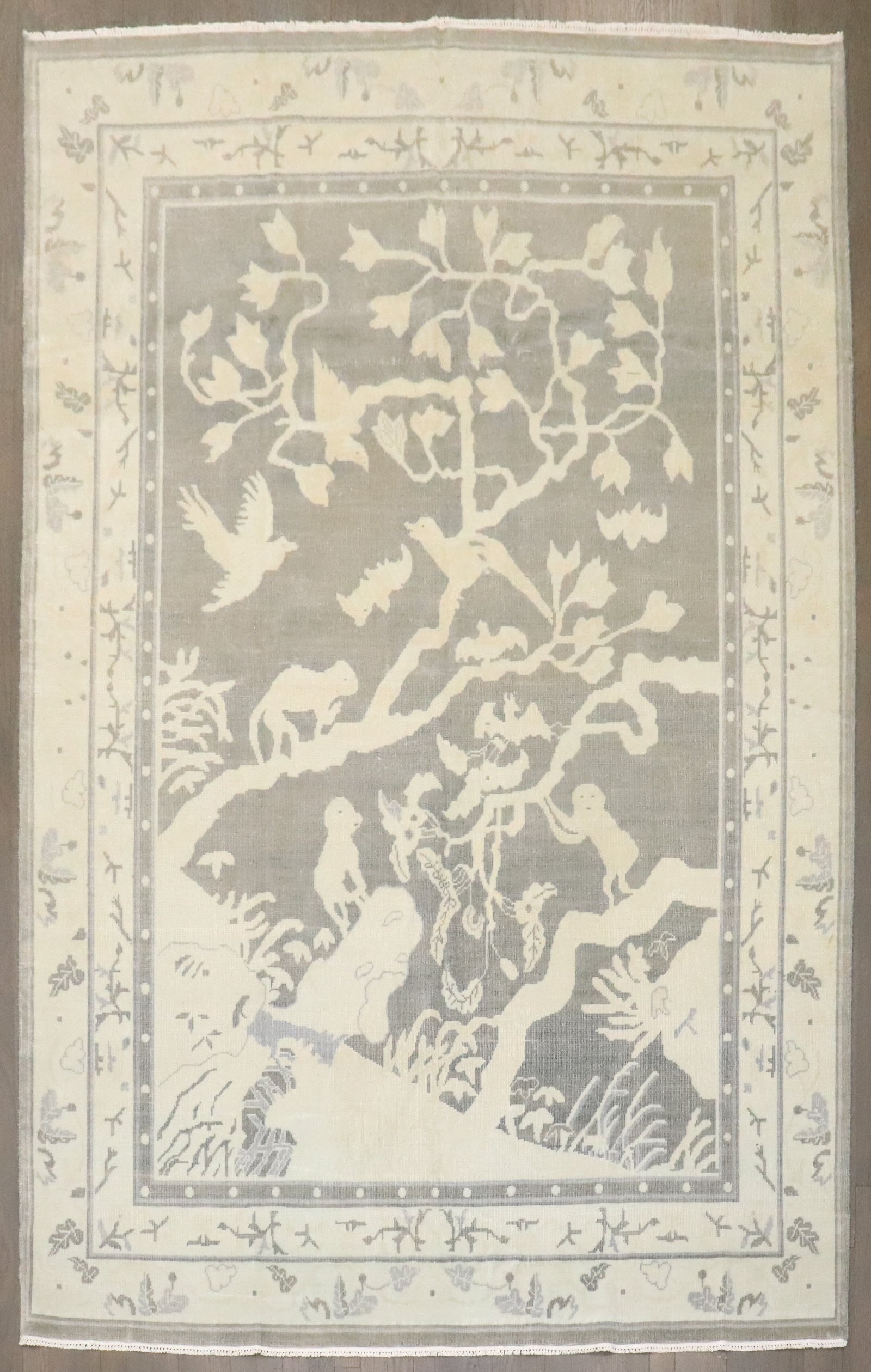 6' x 8' 8" Chinese Peking pictorial rug with monkey design: 6' x 8' 8" Chinese Peking pictorial rug with monkey design Mid-20th-century Chinese vintage rug featuring a monkey pictorial design in a neutral color palette. This pre-owned rug is categorized as int