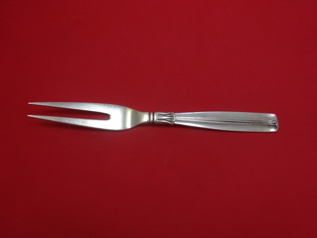 W&S Sorensen Lotus Sterling Silver 2-Tine Cold Meat Fork 8 3/8": W&S Sorensen Lotus Sterling Silver 2-Tine Cold Meat Fork 8 3/8" This exquisite cold meat fork features a stylish 2-tine design and is crafted from high-quality sterling silver. Made by W&S Sorensen, i