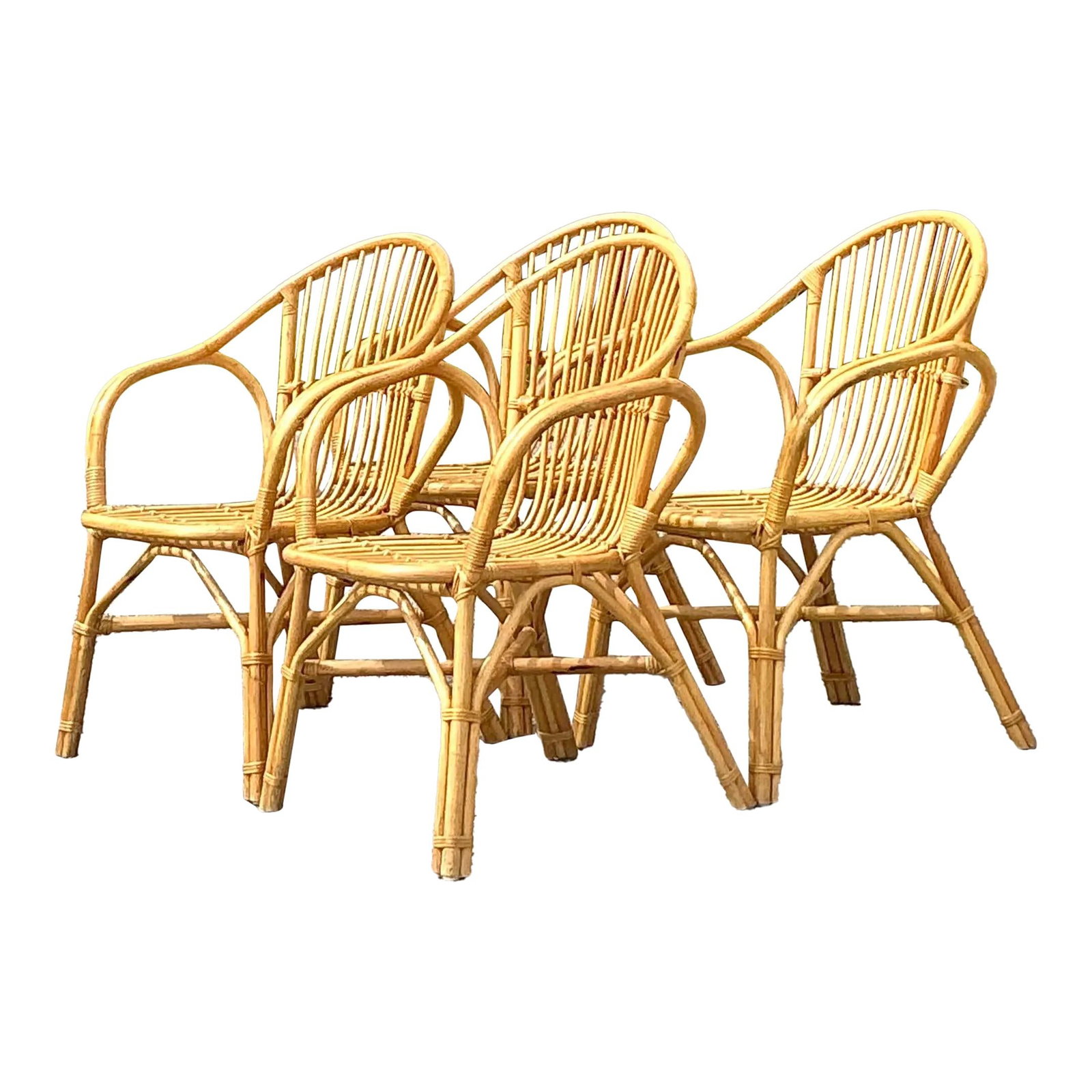 Set of 4 Vintage Coastal Rattan Dining Chairs with Arched Backs: Set of 4 Vintage Coastal Rattan Dining Chairs with Arched Backs Enhance your dining area with this exquisite set of four vintage coastal stick rattan dining chairs. Designed with a beautifully arched 