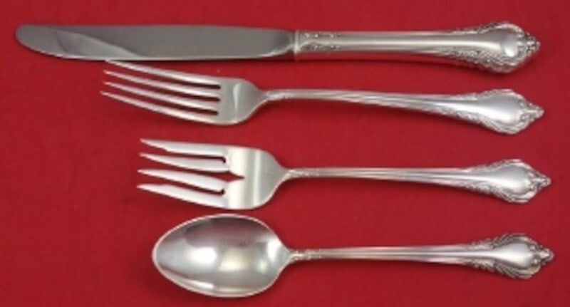 International Sterling Silver Grand Tradition 4-Piece Place Setting: International Sterling Silver Grand Tradition 4-Piece Place Setting This exquisite 4-piece place setting from the Grand Tradition pattern, also known as Grand Recollection, by International Sterling o
